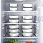 A Set of 8 Stainless Steel Food Storage Containers with Lids